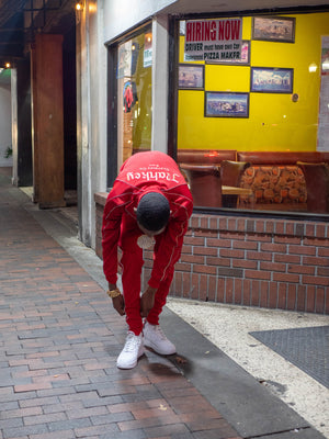 Red track suit